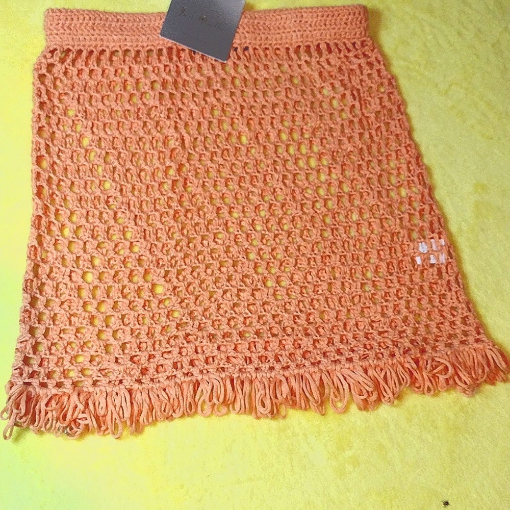 Knit skirt , see thru peach color size small bathing suit cover or?